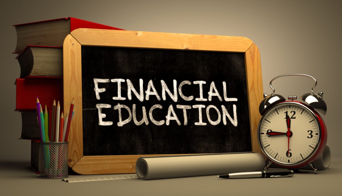 Financial Education Handwritten by white Chalk on a Blackboard.