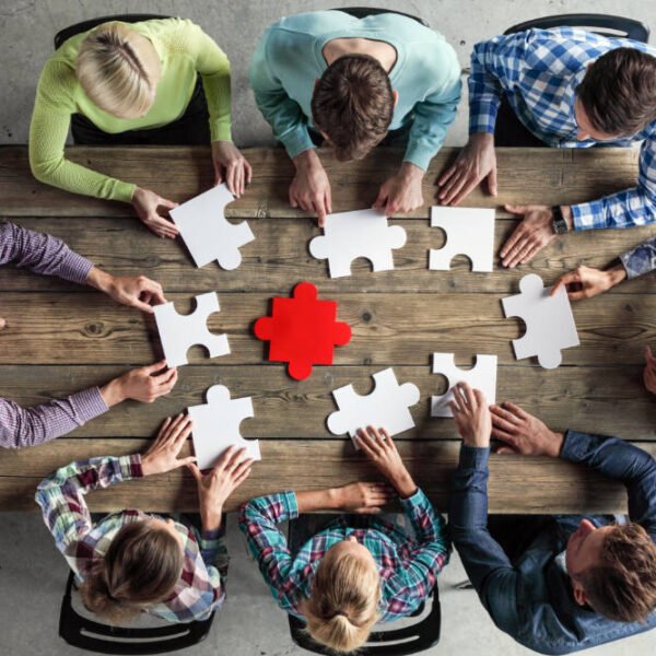 Business people and puzzle